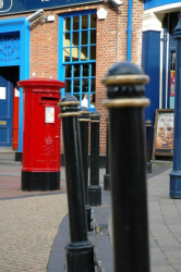 Royal Mail Red Postbox in Empty Street